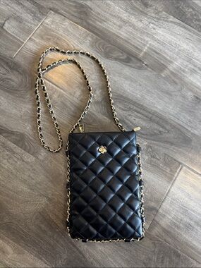 Faux quilted leather chain around crossbody bag